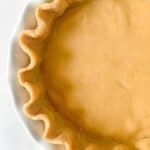 gluten free shortcrust pastry in a white pie dish