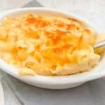 Finished mac and cheese in a white dish