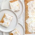 gluten free giant pop tart with 3 slices on 3 white plates