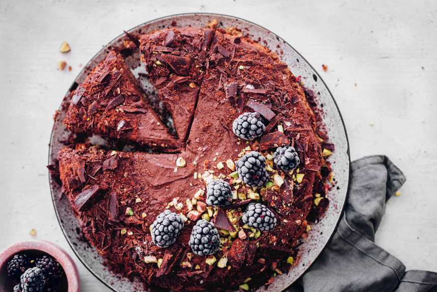 vegan chocolate mousse cake on a white worktop