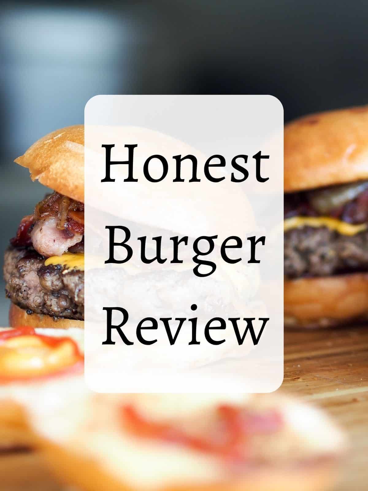 Burgers with buns on a wooden surface with text overlay of honest burger review.