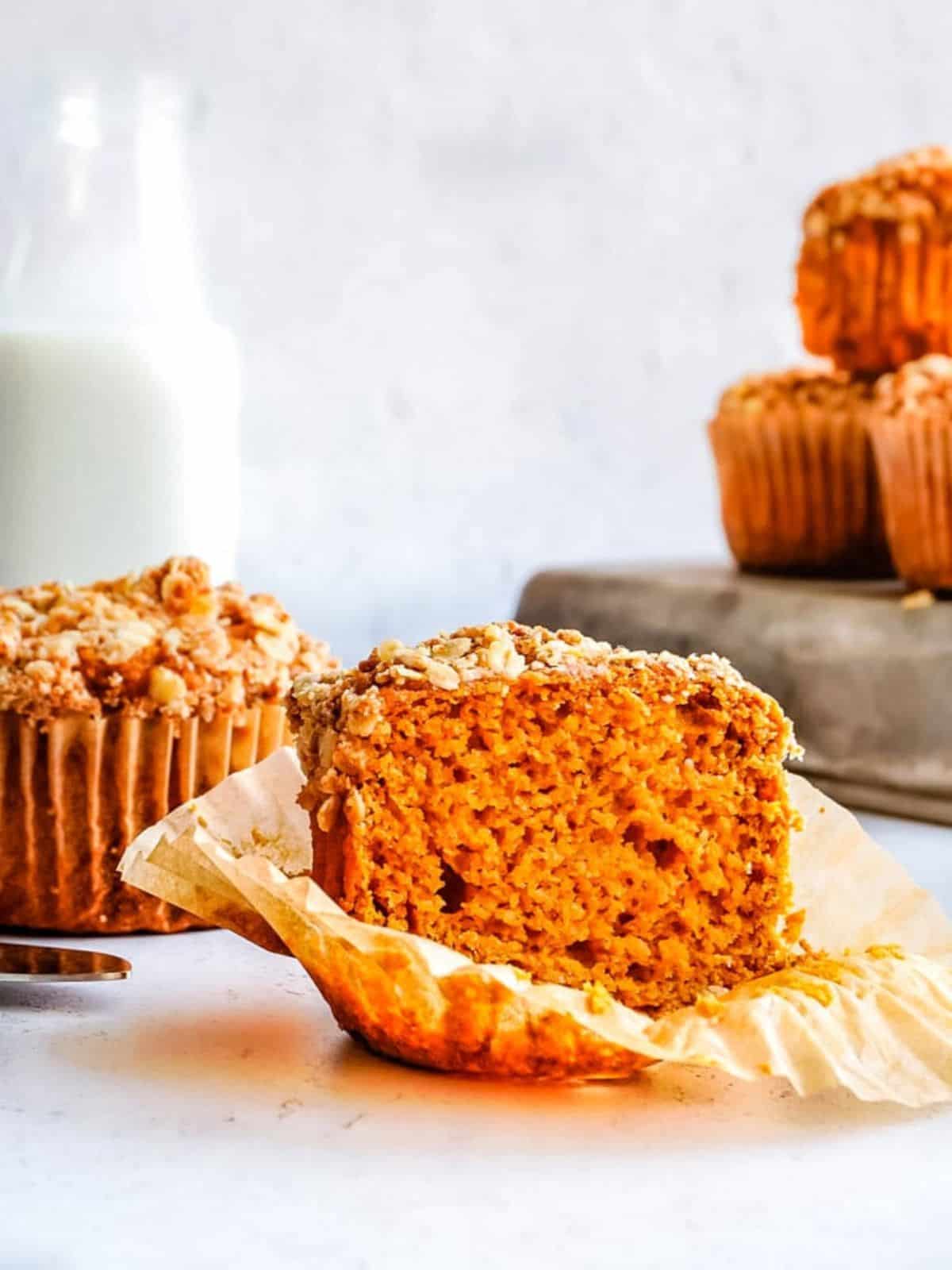 Gluten free pumpkin muffins on a white background.
