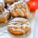 Gluten free apple cookies on parchment paper.