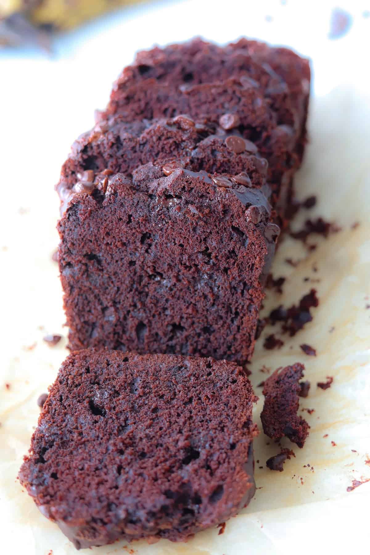 A close up of sliced gluten free chocolate banana bread.